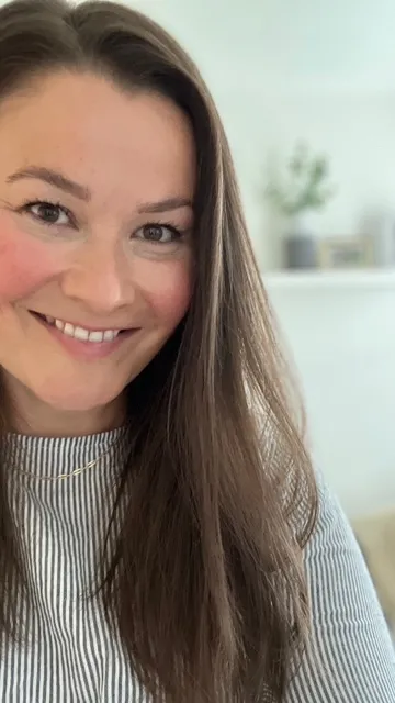 Sarah, smiling
