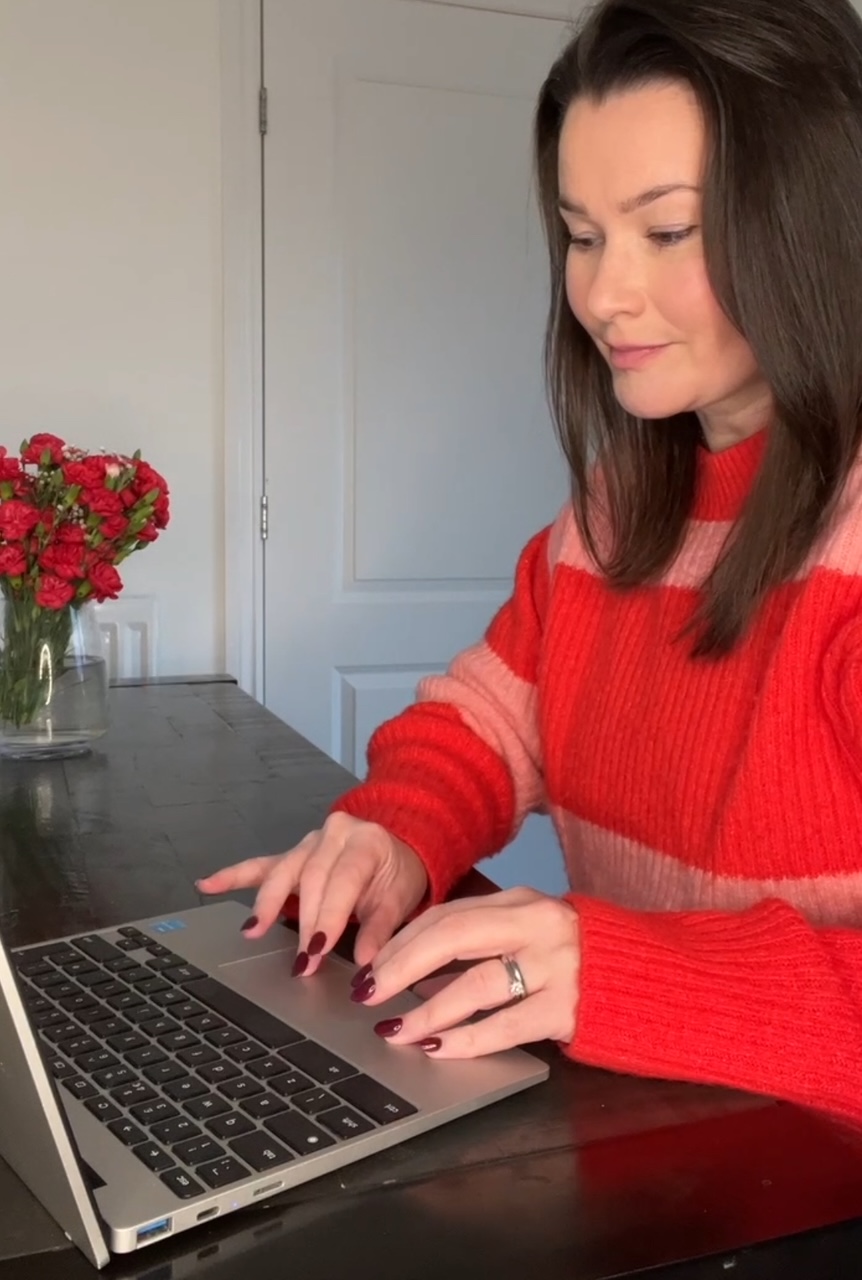 Sarah working on laptop